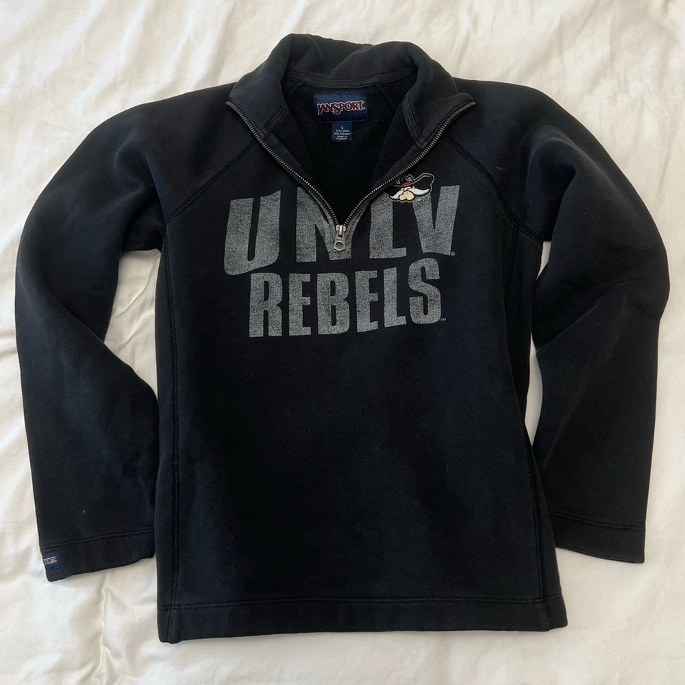 UNLV Rebels half zip up sweater.